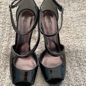 Black open toe shoes. 4 inch heel and ankle strap
